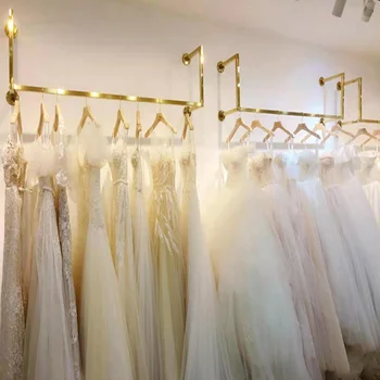 Vjenčanicu prikaži rack clothing radnji zid prikaži rack nerđajućeg čelika žene odeci plafon visi vješalicu